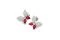 Giorgio Visconti. Orecchini in oro bianco, brillanti e rubini che formano petali di fiori della Collezione “Allure