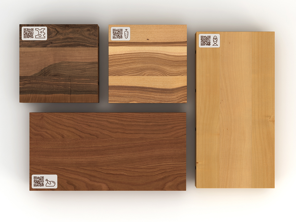 Cut&Connect, della collezione Cook&Connect. Disegnato da Studio Lievito e realizzato da Officinanove. Tagliere in legno composto da quattro moduli dedicati alla lavorazione di differenti alimenti: frassino per la carne; rovere per il pesce; noce canaletto per le verdure e niangon per i formaggi.