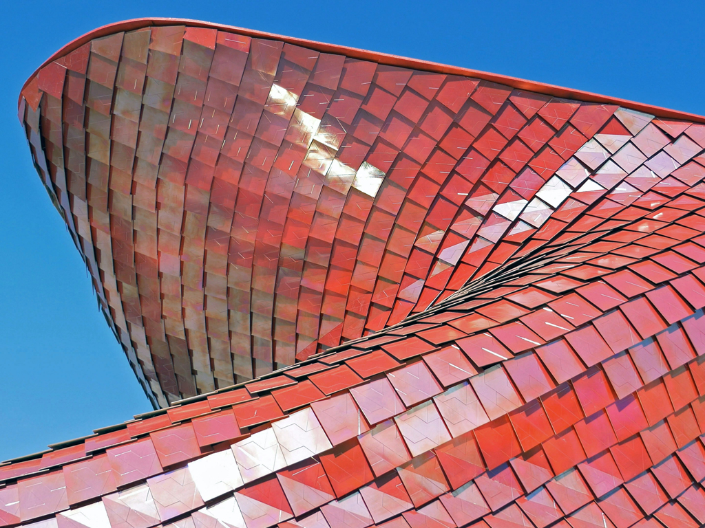 Padiglione Vanke. L'involucro del padiglione di Expo, è rivestito di grès porcellanato tridimensionale, realizzato dalla Casalgrande Padana, dalla speciale colorazione rossa con effetto metallizzato. Le lastre sono frutto di un sofisticato procedimento industriale, processi di smaltatura e cottura ad altissime temperature.