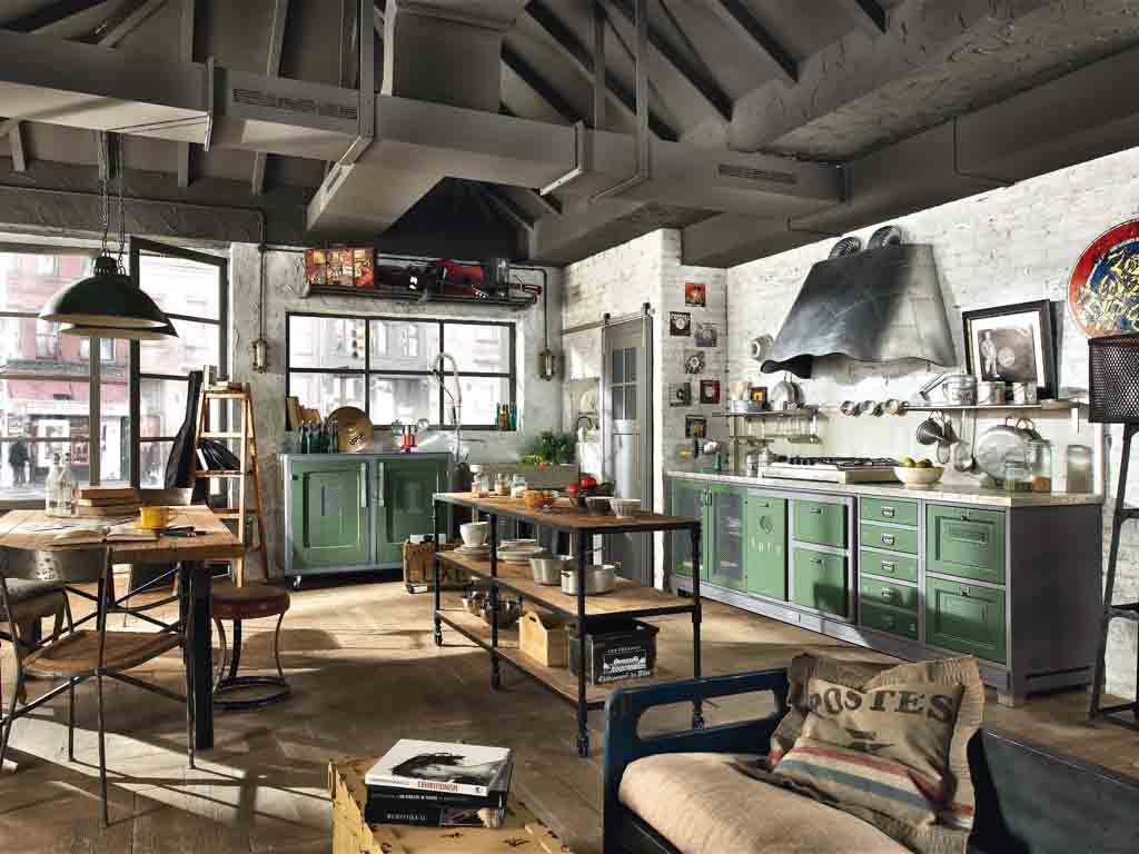 Marchi Group. Cucina Loft. Realizzata in noce americano. Le maniglie in metallo laccato, sono progettate e realizzate in esclusiva. I piani top sono disponibili in ciotoli, in marmo o in cemento.