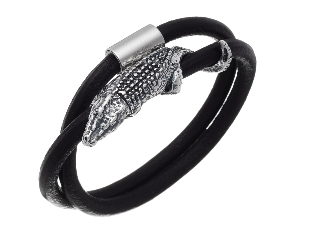 Giovanni Raspini. Una scultura da indossare. Il coccodrillo in argento personalizza un bracciale di grande semplicità.