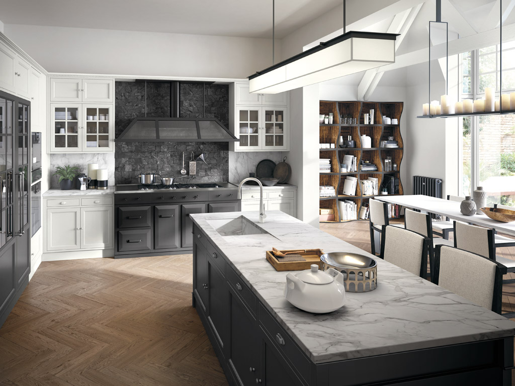 Marchi Cucine. Collezione Gusto Italiano. La linea Artis è un connubio tra presente e passato. Il gioco di contrasti cromatico e materico, infonde all’ambiente un’atmosfera elegante e di classe. L’ampio bancone ad isola con top in marmo pregiato è disponibile con mensole a giorno, con basi chiuse e nella versione snack da completare con gli sgabelli.