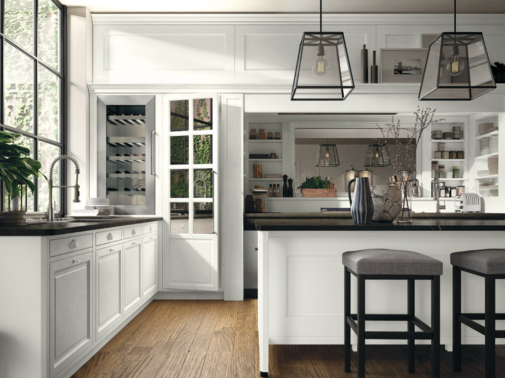 Marchi Cucine. Collezione Gusto Italiano. La cucina Bellagio s’ispira ad uno stile classico e ad un’eleganza mai sfarzosa. Cuore pulsante della cucina è la zona cottura rivestita, come il top del bancone, dal marmo nero Marquinia. Sono disponibili molteplici combinazioni di basi, di mensole a vista e di accessori.