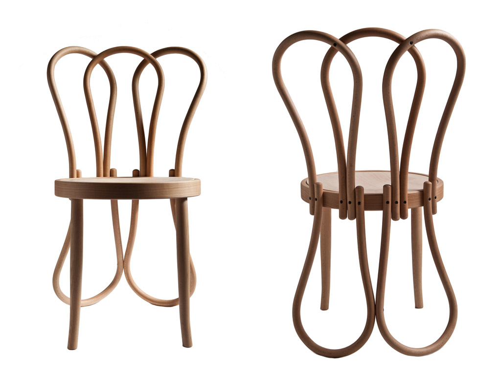 Gebrüder Thonet Vienna GTV. Cinque pezzi di legno curvato modulano il profilo della seduta Post Mundus (2012), design Martino Gamper. Ironia e leggerezza trasformano le gambe e lo schienale in elementi simmetrici.