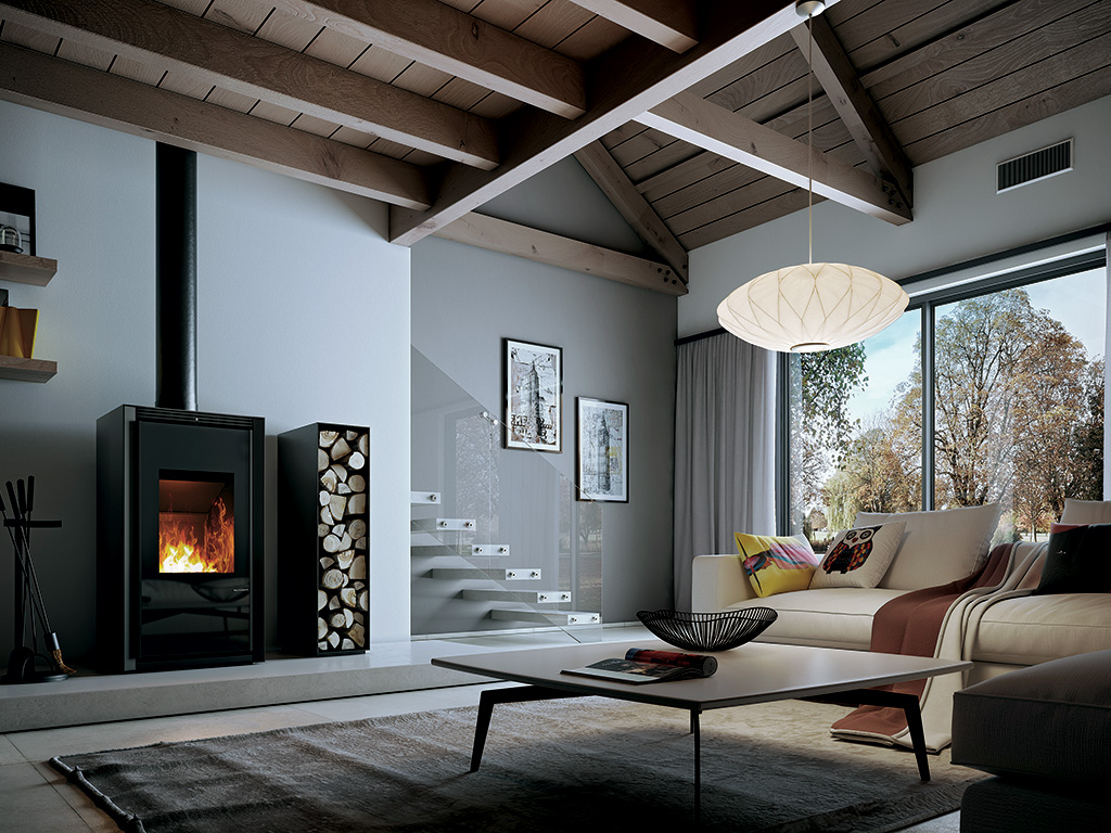 Palazzetti. La stufa Iki Line, firmata dallo studio Marcarch Design di Marco Fumagalli è disponibile in tre versioni. Nell'immagine la Iki Up (dimensioni LxPxH:59 x 54 x 64 cm) verticale, la visuale a tutta altezza del focolare permette il totale controllo della fiamma. La struttura è in acciaio verniciato che incornicia il focolare in Thermofix (cemento refrattario speciale ad altissimo accumulo che ottimizza l’irraggiamento migliorando la combustione e garantendo rendimenti elevati). La portina è basculante.