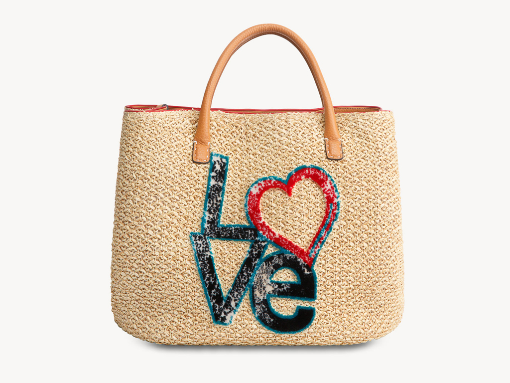 Ermanno Scervino. Ricami lettering vintage-like rendono unica questa shopping bag in rafia con preziosi interni multicolor.