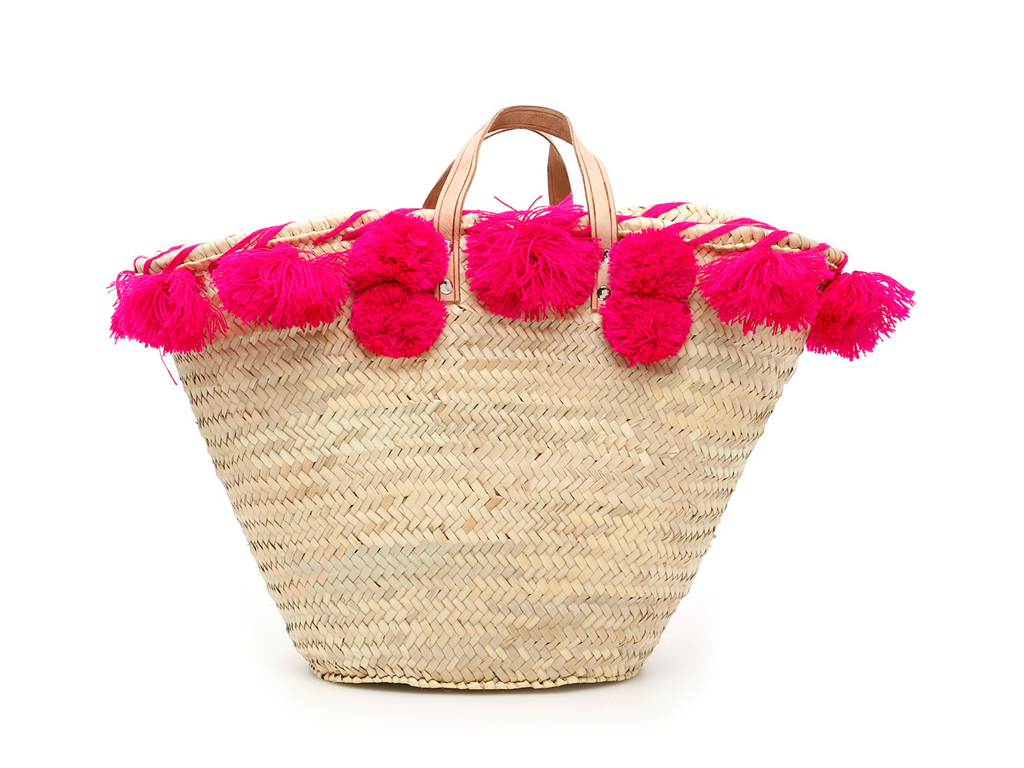 Etincelles su Coltortiboutique.com. Cesto sfoderato in paglia intrecciata decorato con pompon a contrasto e doppio manico in ecopelle.