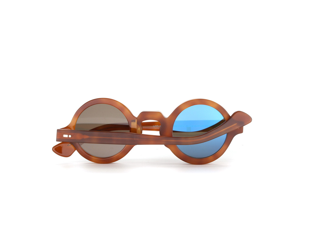 Movitra Spectacles. Movitra 215. Light havana with flash blue sky lenses (Euro 250.00).