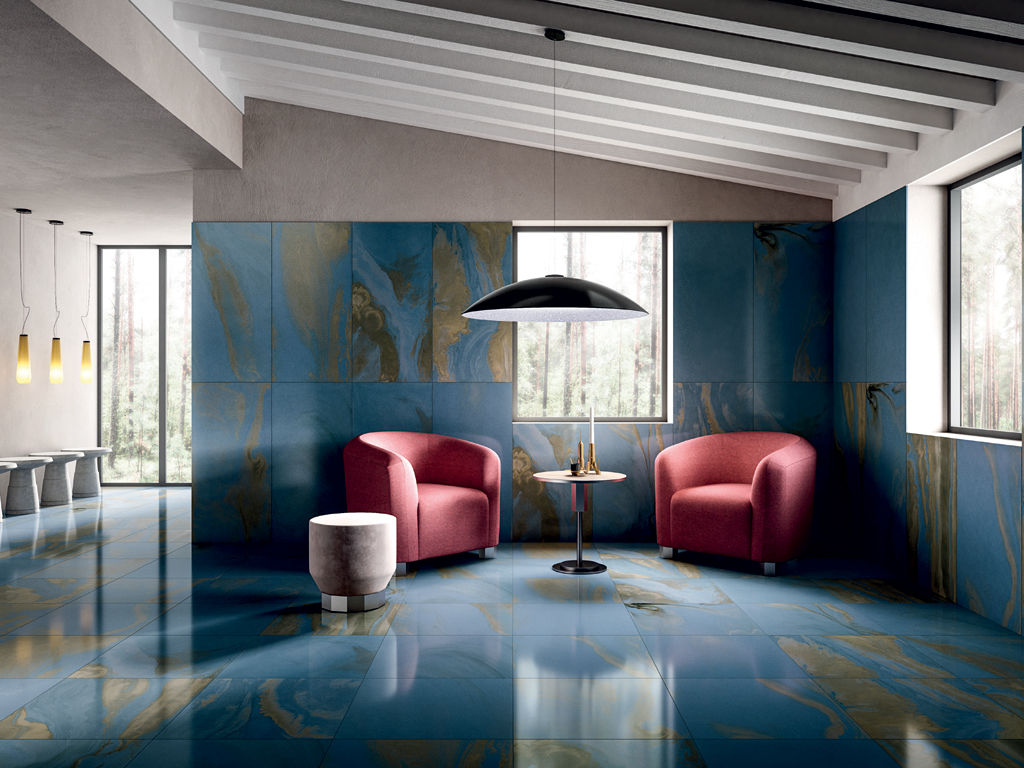 Iris Ceramica. In collaborazione con Diesel Living “Cosmic Marble” viene proposto in un’insolita palette di colori. Ogni lastra sembra un quadro astratto ispirato a pianeti e satelliti: “Venus” petrolio e oro, “Uranus” sfumature cerulee, “Pluton” tra il grigio e il nero con inserti oro, “Saturne” in sfumature di grigio, “Mars” in tonalità rosse, “Lune” il più chiaro e delicato.