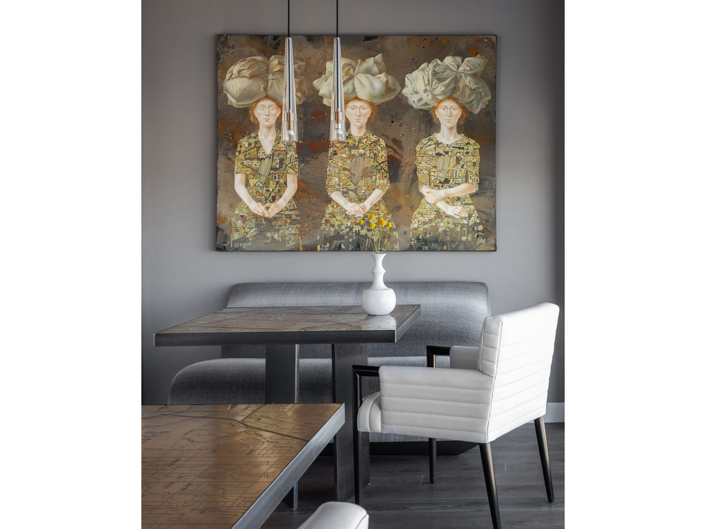 Benning Design Construction. Siamo ancora nella sala da pranzo. Qui un’altra opera d’arte, abilmente posizionata sopra il divanetto, definisce una piccola area destinata al relax.