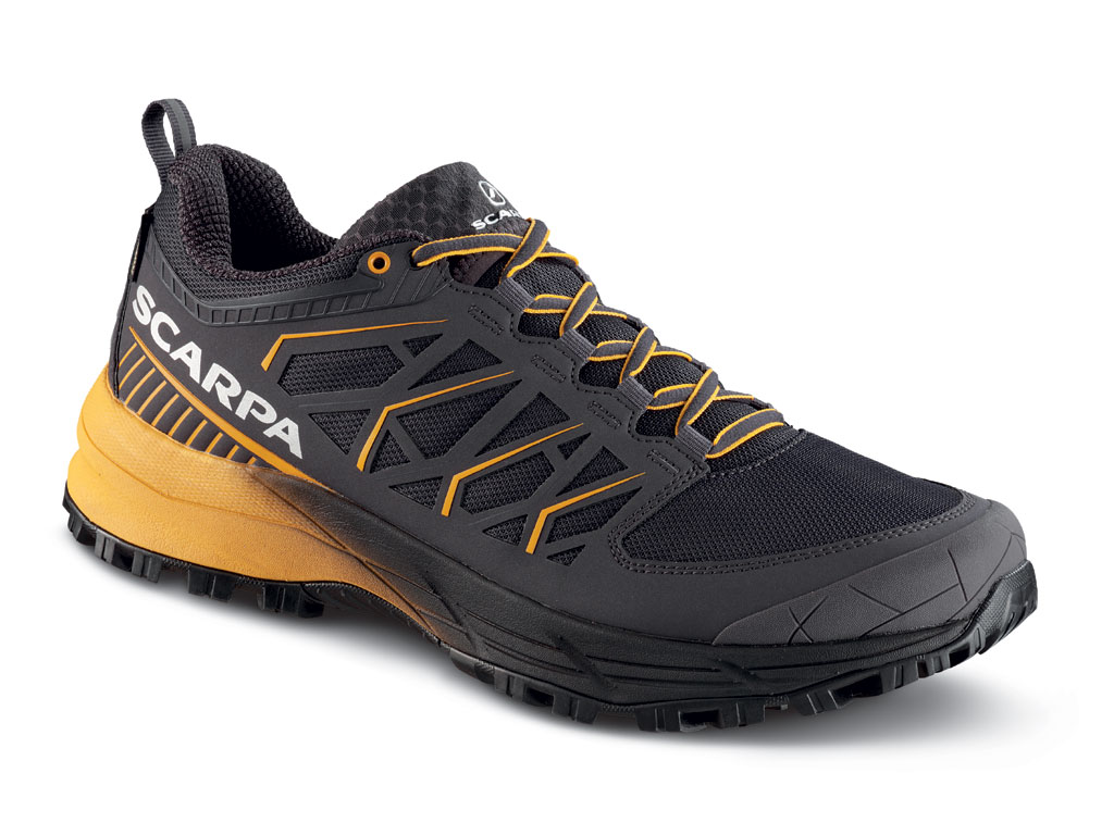 Scarpa®. Modello Proton XT GTX. Colore: Obsidian – Mango. Taglia: 39 – 48 (con mezze taglie). Peso: 370 g (mezzo paio tg.42). Drop: 8mm. Prezzo consigliato al pubblico euro 189,00.