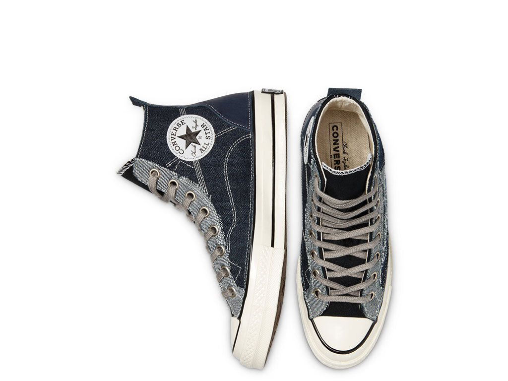 Converse. All Star. Denim Patchwork Chuck 70 high top. Sneakers alte in materiali misti. Design a patchwork asimmetrico in denim misto su tela. Linguetta in tela a tinta unita. Lacci grigi vintage. Iconica patch Chuck Taylor sulla caviglia e license plate vintage. Prezzo: euro 89,97.