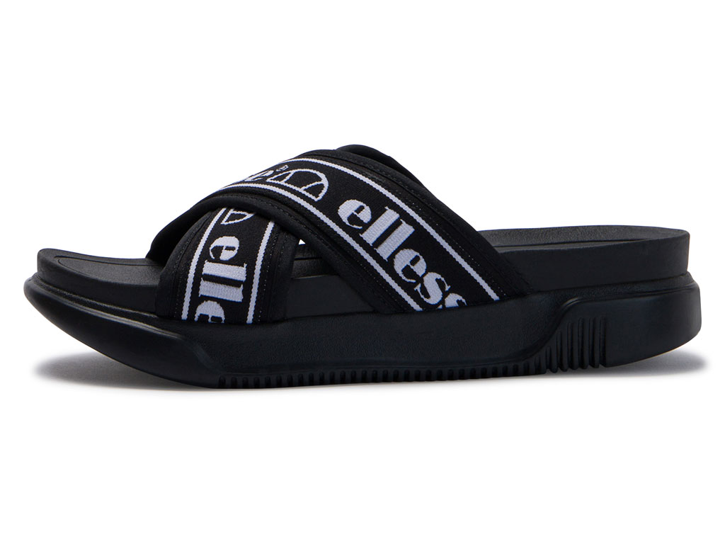 Ellesse. Sandalo Denso Cross da donna nero/bianco. Suola spessa e rigata e cinturini, con logo, incrociati. Sottopiede a compressione Prezzo: euro 40,00.