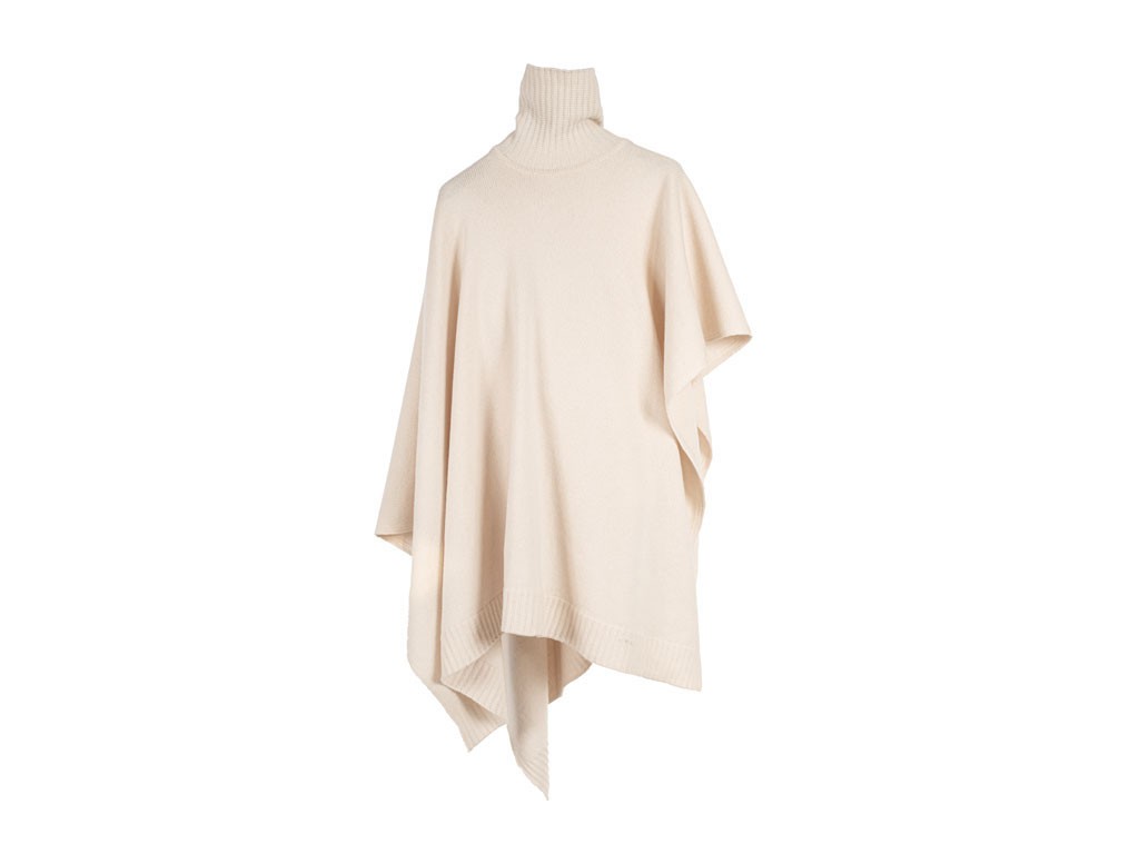 Abstract Scarf. La mantella Burro, dal collo alto, può essere indossata anche come pull over. In maglia misto cashmere/lana.