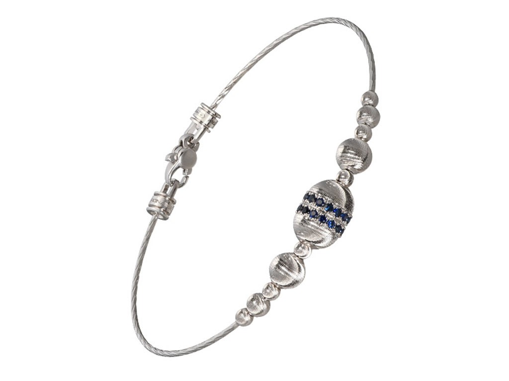 Officina Bernardi. Bracciale Blangle Empire in oro bianco 18kt e zaffiri blu e sfere diamantate Seta. Prezzo: euro 1.790,00.