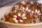 Stollen di Cristo o Zelten di Natale. Pane dolce con uvetta, canditi e mix di spezie. Tradizionale dolce altoatesino. Ricetta del ricettario Dolci Dolomiti di Heinrich Gasteiger, Gerhard Wieser, Helmut Bachmann.