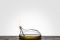 Blueside Emotional Design. “Lampara” evoca le lampade ad olio dell’antica Grecia. È alimentata con olio di oliva che per capillarità imbeve lo stoppino creando le condizioni per l’accensione. Fa parte della collezione di opere in vetro soffiato borosilicato “Le Nasse e l’olio”, progettata dall’architetto Simone Micheli. Dimensioni: 120x130 mm.