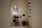 Al piano inferiore dello show room Kartell by Laufen a Milano, una delle sette ambientazioni di sala da bagno