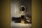 Al piano inferiore dello show room Kartell by Laufen a Milano, una delle sette ambientazioni di sala da bagno