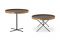 è De Padova. Tavolino con vassoio Chab-Table - design Nendo (2005). Ruotando la base si possono ottenere due altezze e il piano ha anche la funzione di vassoio. Il pannello in multistrato di faggio è rivestito in laminato e il bordo in massello di faggio curvato. La base è in acciaio. 