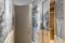 Suite JDF, progettata da Jacopo della Fontana, al TownHouse Duomo. L'anticamera. Carte decorate a mano - Misha handmadewallpaper - con disegni dei parchi e dei monumenti di Milano 