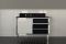 Devon&Devon. Mobile porta lavabo Jazz. Piano e alzata in marmo nero marquinha, in marmo bianco carrara o qualsiasi altro marmo. Struttura in finitura cromo, oro chiaro o nickel lucido (dimensioni 1 anta con cassettiera: cm. 120,2x62,4x98h).
