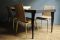 Quadricorn Chair by NB Milano. Seduta in pelle pieno fiore. Piedi in ottone. Tavolo Isetan by NB Milano: nella versione base, il piano è in lastra di ottone naturale e i piedi e le parti a vista sono in wengé pieno. Personalizzabile nella versione full ottone.