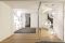 Al piano interrato dello showroom Albed a Milano, la parete modulare Vista ufficio. L'illuminazione è Martinelli Luce