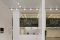 Show room Florim a Milano. Progetto: arch. Andrea Maffei. L'area soppalcata è stata pensata come uno spazio di rappresentanza  sempre in contatto con la parte espositiva del piano terra.
