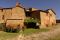 Borgo e Castello di Gargonza. Esterno di Casa Palle. Era il vecchio forno, utilizzato da tutte le famiglie del villaggio per cuocere il pane e i dolci. Ogni famiglia aveva un giorno stabilito per l'utilizzo.