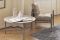 Flou. La collezione IKO, poltroncina e tavolino. Design Rodolfo Dordoni. Poltroncina: struttura tubolare in acciaio e rivestimento in cuoio non sfoderabile con seduta e schienale con rivestimento sfoderabile in tessuto, pelle o ecopelle. Tavolino: piano in marmo e struttura tubolare in acciaio.