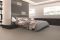 Casalgrande Padana. Earth by Pininfarina. L'originalità della collezione è la combinazione di lastre ceramiche con una serie di elementi di decoro ricchi di suggestioni, che rimandano alle streamline cars. Nell'immagine: Tortora 2, Tortora 4, Bianco, Line, Listello Daniela Silver.