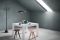 Zanotta. Nell'immagine, da sinistra: appendiabiti “Servomanto”, design Achille Castiglioni della serie “Servi” di Achille & Pier Giacomo Castiglioni; tavolo “Quaderna” design Superstudio; sgabelli “Ivo” in rovere naturale e noce Canaletto, design Frank Rettenbacher.
