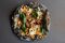 The Green Spot. Barcelona. En Compañía de Lobos. Pizza negra de carbón activado con calabaza, cebolla caramelizada, queso de cabra y pistachos. Pizza nera al carbone vegetale con zucca, cipolle caramellate, formaggio di capra e pistacchi (photo Paula Ospina).
