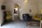 Relais Villa Aieni. Valle d’Itria. San Vito dei Normanni. La struttura vecchia accoglie le tre camere da letto, una grande sala da pranzo, con il soffitto a volta in pietra, e una serie di aree salotto/lettura.