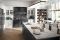 Marchi Cucine. Collezione Gusto Italiano. La linea Artis è un connubio tra presente e passato. Il gioco di contrasti cromatico e materico, infonde all’ambiente un’atmosfera elegante e di classe. L’ampio bancone ad isola con top in marmo pregiato è disponibile con mensole a giorno, con basi chiuse e nella versione snack da completare con gli sgabelli.