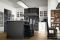 Marchi Cucine. Collezione Gusto Italiano. La linea Artis è un connubio tra presente e passato. Il gioco di contrasti cromatico e materico, infonde all’ambiente un’atmosfera elegante e di classe. Le ante a specchio nascondo il frigo ampliando lo spazio della cucina. La cappa in metallo e vetro lavorato, vero gioiello di design, smorza il ritmo compositivo del piano cottura in acciaio.