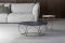 Bonaldo. “Arbor” progettato da Dondoli e Pocci coniuga l’essenzialità occidentale al gusto orientale per la decorazione. La base, in metallo, è infatti la corolla di un fiore. I petali, stilizzati, sostengono il piano disponibile in cristallo o ceramica.