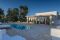 Tenuta del Lauro. Valle d’Itria, Locorotondo. Puglia. Sempre una veduta della zona living con piscina, vasca idromassaggio e zona benessere.
