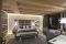 Rosa Alpina Relais & Châteaux. Nell’immagine la Master Suite una delle tre camere doppie dello Chalet Zeno, tutte collegate tra loro. Lo Chalet pur essendo separato dell’Hotel è dotato di un ascensore privato per poter accedere alla piscina, alla spa e alla palestra.