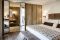 Grand Hotel Courmayeur Mont Blanc. La Suite Signature composta da camera, soggiorno e un balcone panoramico.