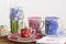Taitù. Tazzine da caffè, mug con coperchio e piattini da frutta della collezione “Flora”. Piccole viole sbocciano sulla porcellana. Da mixare tra di loro per una tavola sempre invitante e originale.