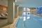Alagna Experience Resort. Nell'immagine Acqua Bianca Spa, area benessere (450mq) dotata di sauna finlandese, bagno di vapore aromaterapico, docce emozionali, zona relax, mountain shower e una piscina interna riscaldata che prosegue all’esterno e si affaccia su un panorama mozzafiato oltre ad una serie di trattamenti rilassanti, sportivi ed estetici.