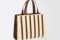 Max Mara. Borsa “Whitney Bag” realizzata in midollino e cuoio, con doppi manici a contrasto e tracolla regolabile rimovibile.