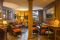 Hotel Hermitage Restaurant & Spa. Boiserie e atmosfera confortevole nel Cocktail Bar.