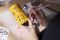 Acqua di Parma. L’artista britannico Clym Evernden nel suo studio mentre dipinge la celebre cappelliera di Colonia, la fragranza icona di Acqua di Parma.