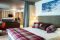 Hotel La Vetta. San Domenico. Varzo. Private Wellness Suite è l’esclusiva suite per due persone con Private SPA integrata e doppio balcone per il massimo relax e la totale privacy. Nell'immagine la camera da letto.