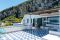 Italy Sotheby’s International Realty. Capri. Il pavimento del terrazzo panoramico, bellissimo, è in cotto smaltato bianco e blu ed è realizzato da Gallerie Elena Superfici.