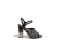Salvatore Ferragamo. Il sandalo “Refracted Heel”  dall’iconico tacco “Fiore” ha morbidi listini in pelle ricoperti da un pavé di cristalli.