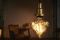 Osram. Apparecchio d’illuminazione “Vintage Edition 1906 PenduLum” con lampada a forma di cuore della collezione “Vintage Edition 1906 LED”, qui nel modello “Heart”.